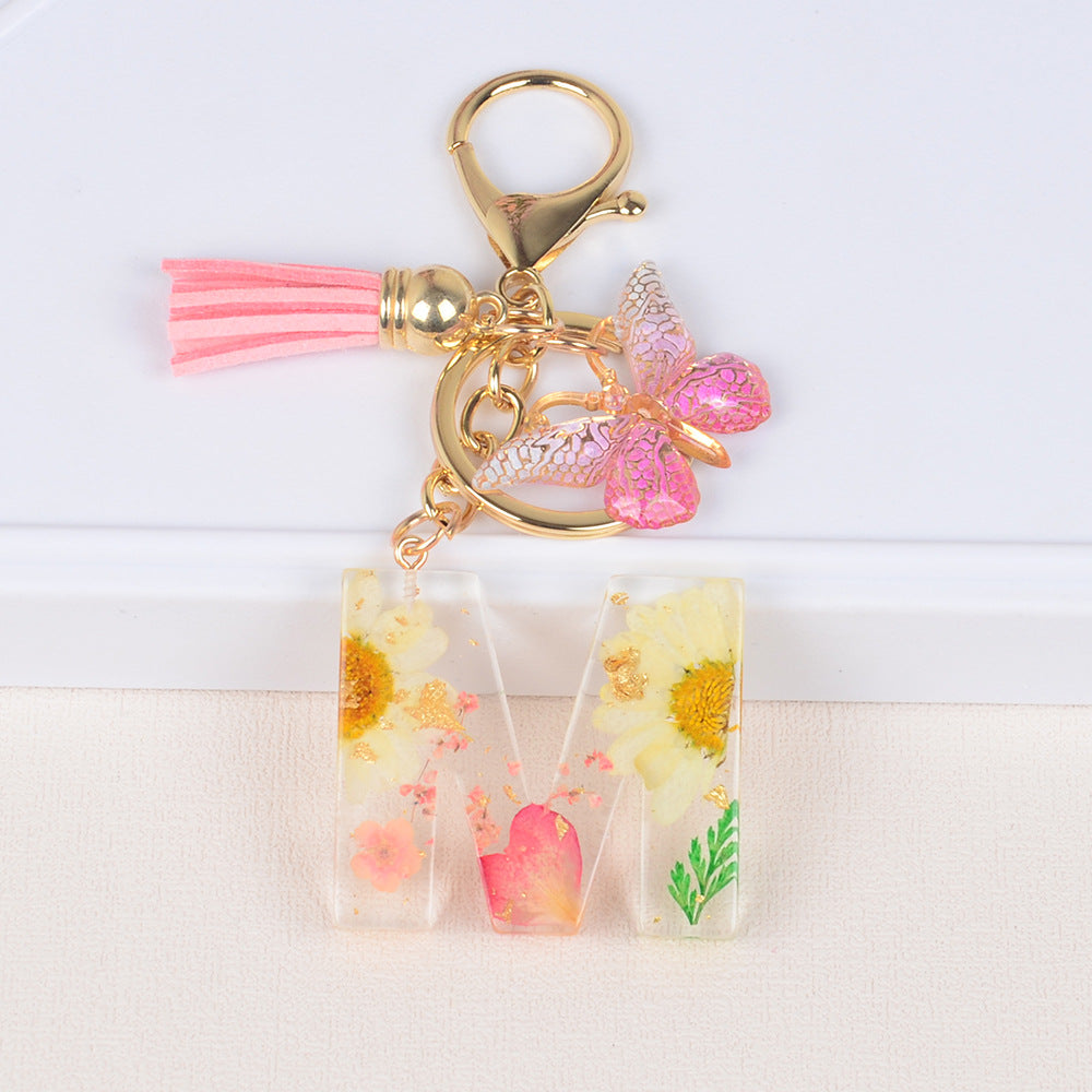 卸売ドライフラワーレター樹脂キーホルダー